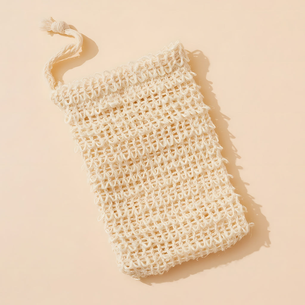 Beige woven soap bag on a beige background
